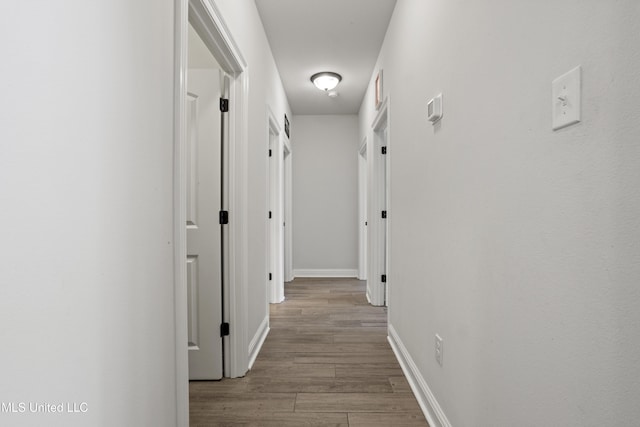 9363 Taylor Pl, Ocean Springs, MS 39564 - hallway with wood finished floors and baseboards