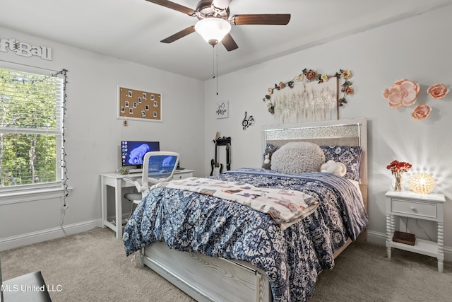 9363 Taylor Pl, Ocean Springs, MS 39564 - carpeted bedroom featuring baseboards and ceiling fan