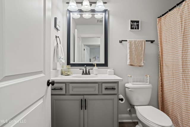 9363 Taylor Pl, Ocean Springs, MS 39564 - bathroom featuring toilet and vanity