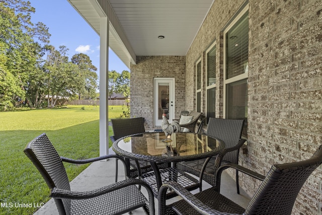 9363 Taylor Pl, Ocean Springs, MS 39564 - view of patio featuring outdoor dining area
