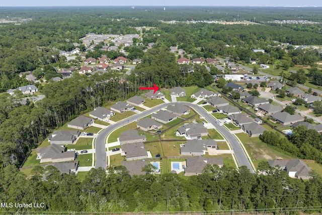 9363 Taylor Pl, Ocean Springs, MS 39564 - aerial view of property's location with a heavily wooded area and nearby suburban area