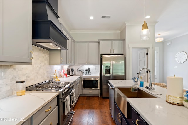 6731 Bobwhite Cir, Southaven, MS 38672 - kitchen featuring appliances with stainless steel finishes, custom exhaust hood, ornamental molding, a sink, and backsplash