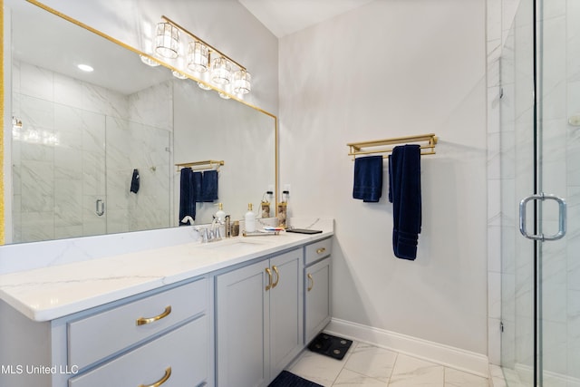 6731 Bobwhite Cir, Southaven, MS 38672 - bathroom featuring marble look tiles, a shower stall, baseboards, and vanity