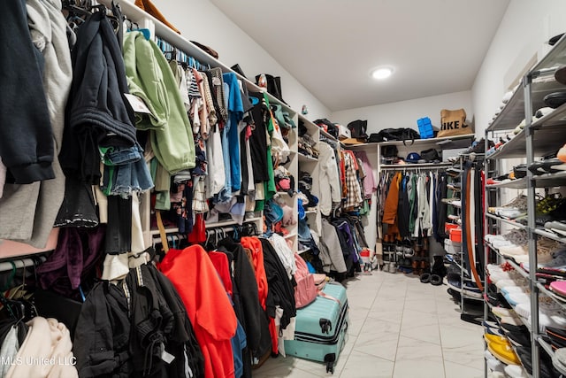 6731 Bobwhite Cir, Southaven, MS 38672 - walk in closet with marble finish floors