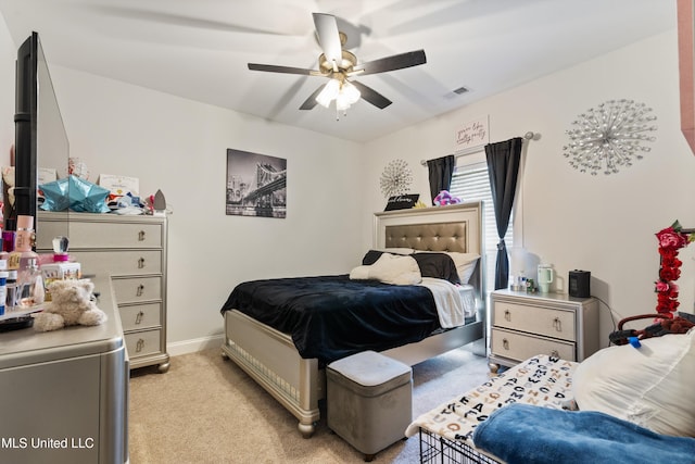 6731 Bobwhite Cir, Southaven, MS 38672 - bedroom featuring light carpet, a ceiling fan, and baseboards