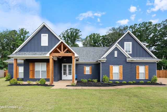 6731 Bobwhite Cir, Southaven, MS 38672 - view of front facade with board and batten siding, french doors, and brick siding