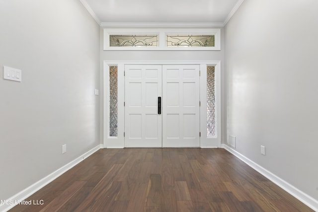 foyer entrance with crown molding and dark hardwood / wood-style flooring