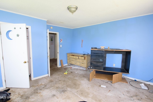 bedroom featuring crown molding and baseboards