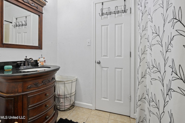 bathroom featuring vanity and tile patterned flooring