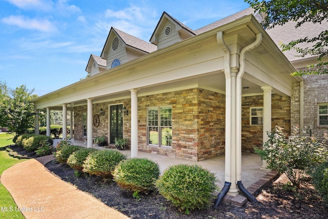 445 Carey Chapel Rd, Red Banks, MS 38661 - view of side of home with a porch and roof with shingles
