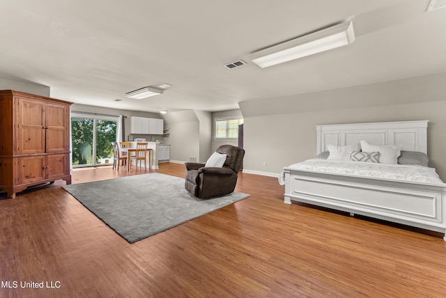 445 Carey Chapel Rd, Red Banks, MS 38661 - bedroom featuring wood finished floors and baseboards