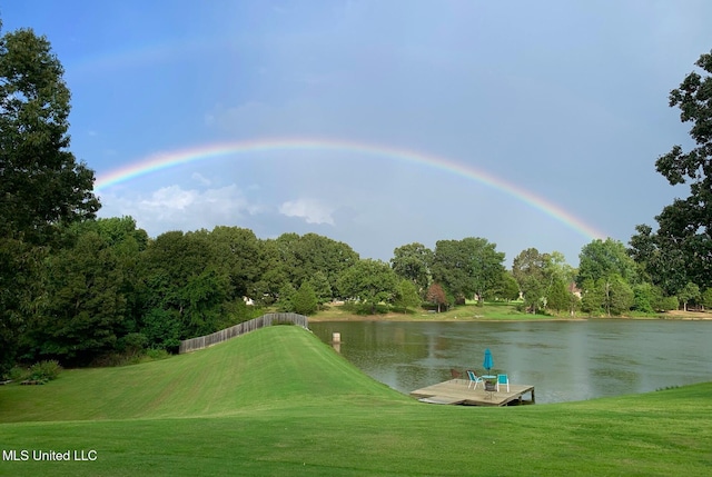 445 Carey Chapel Rd, Red Banks, MS 38661 - view of community featuring a water view, a lawn, and view of scattered trees