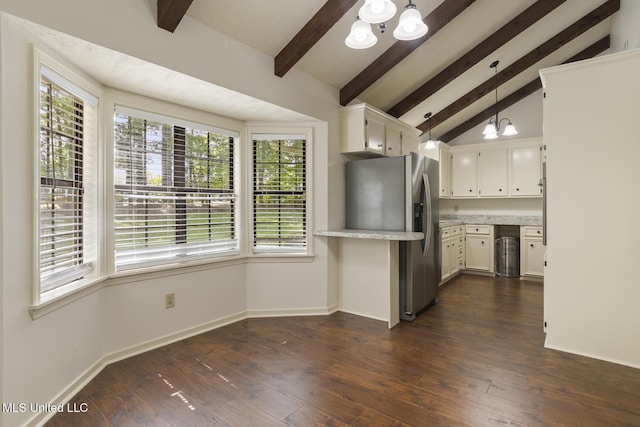 121 Kenbridge Ln, Madison, MS 39110 - kitchen with stainless steel fridge, vaulted ceiling with beams, plenty of natural light, and a chandelier
