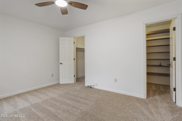 121 Kenbridge Ln, Madison, MS 39110 - unfurnished bedroom featuring light colored carpet, baseboards, a walk in closet, and a closet