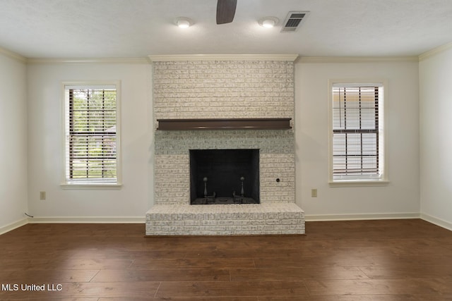 121 Kenbridge Ln, Madison, MS 39110 - unfurnished living room featuring visible vents, ornamental molding, baseboards, and wood finished floors