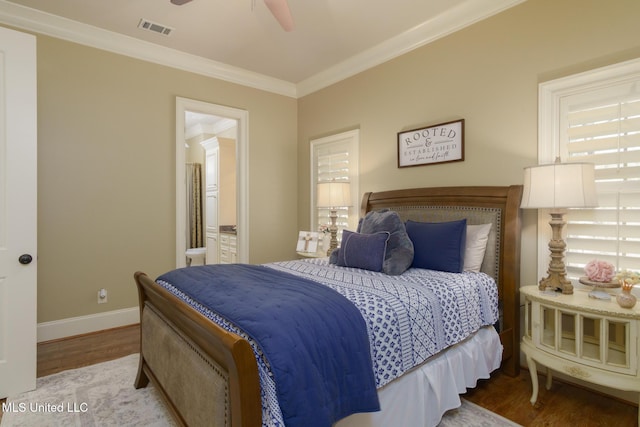 bedroom with visible vents, light wood-style floors, ornamental molding, a ceiling fan, and baseboards