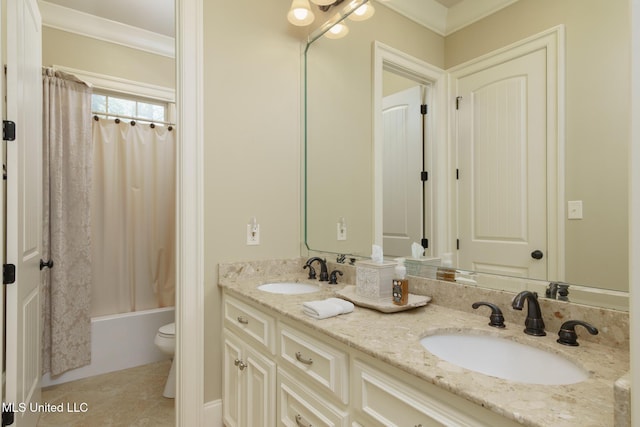 full bathroom featuring double vanity, ornamental molding, a sink, and shower / bath combo with shower curtain