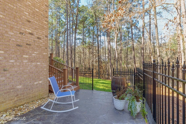 view of patio / terrace with fence