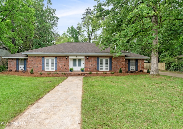 ranch-style house with a front yard