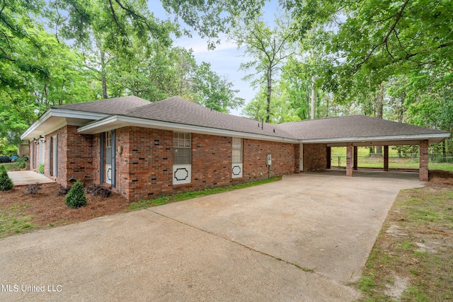 view of property exterior with a carport