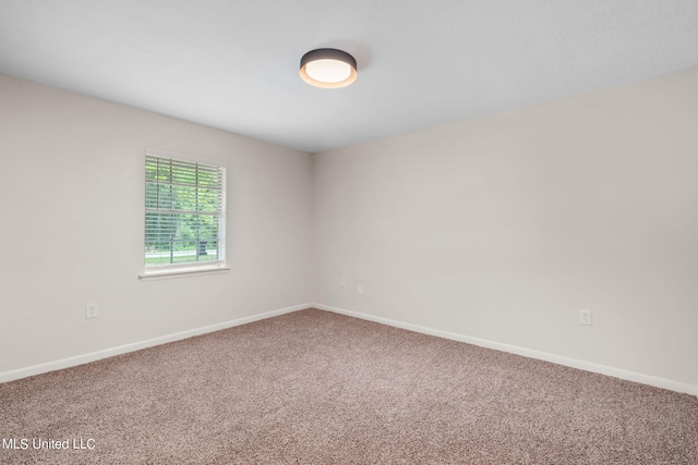 unfurnished room featuring carpet floors