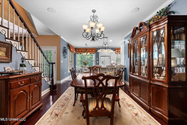 10 Lakeview Cir, Purvis, MS 39475 - dining room with a chandelier, stairway, baseboards, ornamental molding, and dark wood-type flooring