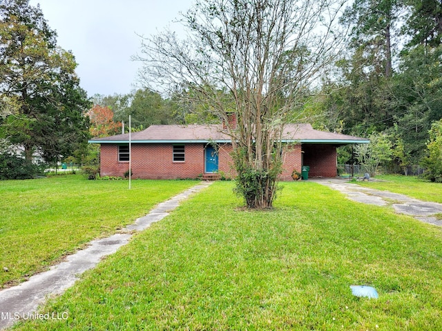 818 Cedar Grove Ave, Picayune, MS 39466 - single story home with asphalt driveway, an attached carport, a front lawn, and brick siding