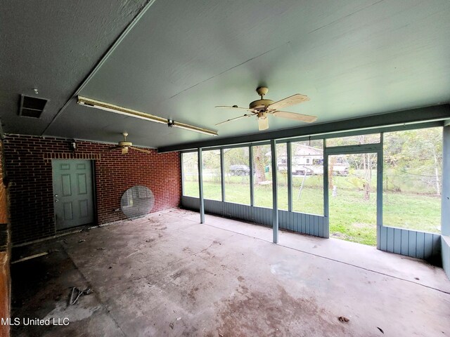 818 Cedar Grove Ave, Picayune, MS 39466 - unfurnished sunroom featuring a ceiling fan
