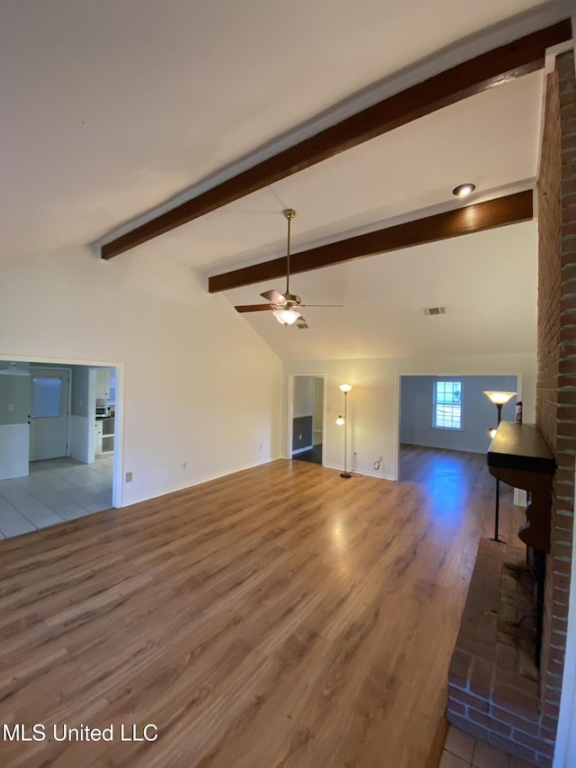 790 Ewa Pl, Diamondhead, MS 39525 - unfurnished living room with wood finished floors and a ceiling fan