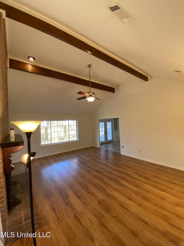 790 Ewa Pl, Diamondhead, MS 39525 - unfurnished living room featuring wood finished floors and a ceiling fan