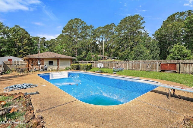 428 Simpson Cir, Mendenhall, MS 39114 - view of swimming pool with a fenced backyard, a patio area, and an outdoor structure