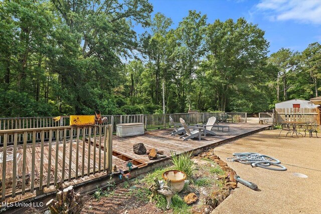 428 Simpson Cir, Mendenhall, MS 39114 - wooden deck featuring outdoor dining area