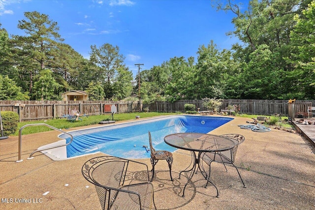 428 Simpson Cir, Mendenhall, MS 39114 - view of pool with a fenced backyard, a patio area, and view of scattered trees