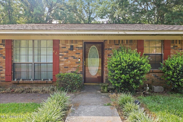 428 Simpson Cir, Mendenhall, MS 39114 - property entrance featuring brick siding and a porch