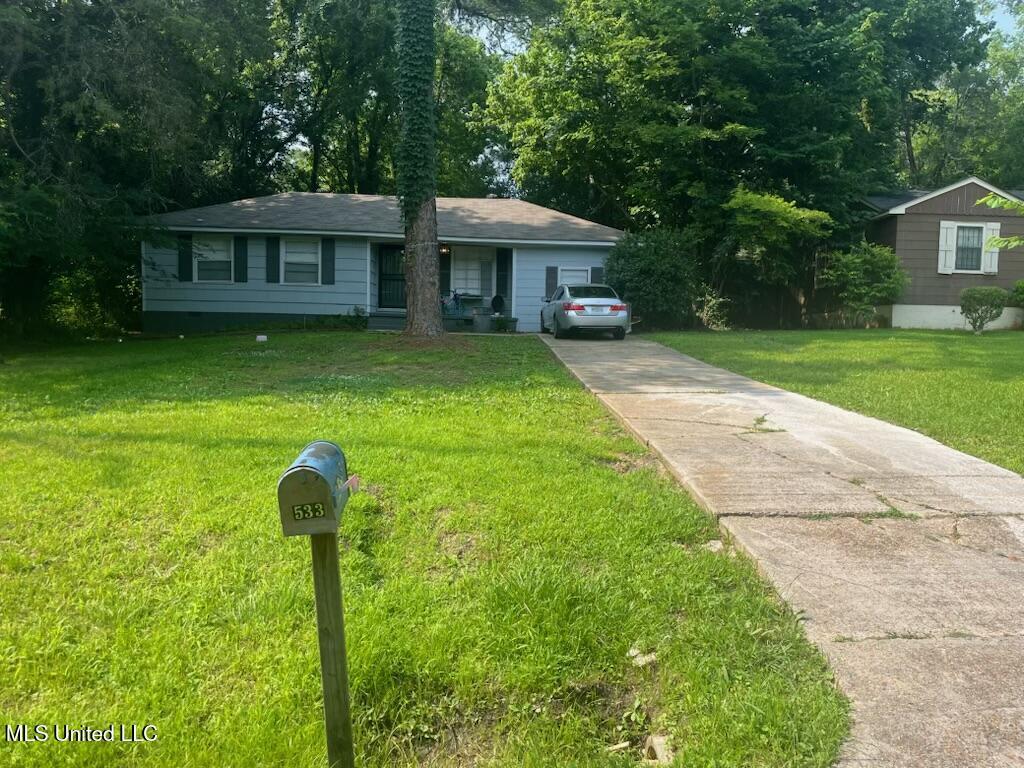 533 Lawrence Rd, Jackson, MS 39206 - single story home with driveway and a front yard