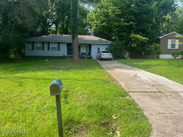 533 Lawrence Rd, Jackson, MS 39206 - single story home with driveway and a front yard