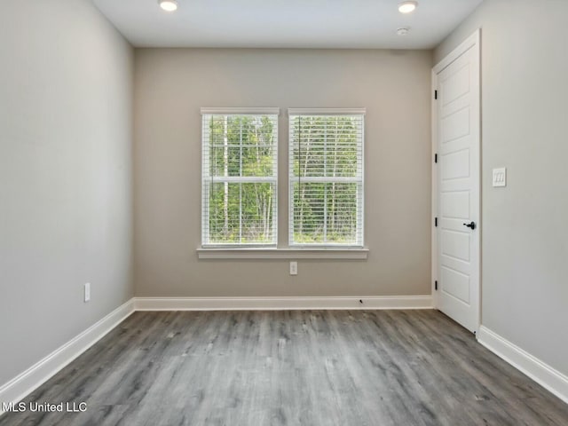 10507 Glade Cv, Gulfport, MS 39503 - spare room featuring wood finished floors, recessed lighting, and baseboards