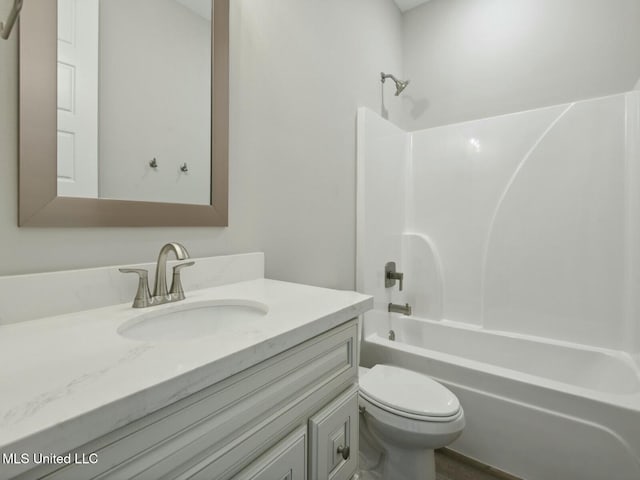 10507 Glade Cv, Gulfport, MS 39503 - bathroom featuring toilet, bathtub / shower combination, and vanity