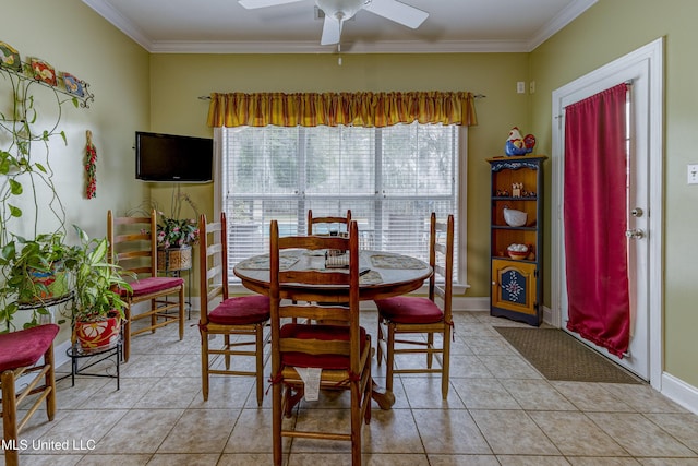 102 Grand Bear Cir, Vicksburg, MS 39183 - dining space featuring a ceiling fan, ornamental molding, light tile patterned flooring, and baseboards