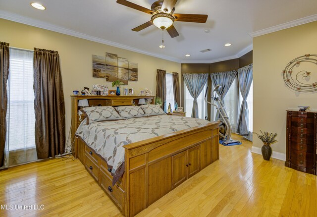 102 Grand Bear Cir, Vicksburg, MS 39183 - bedroom with light wood-style floors, visible vents, and multiple windows