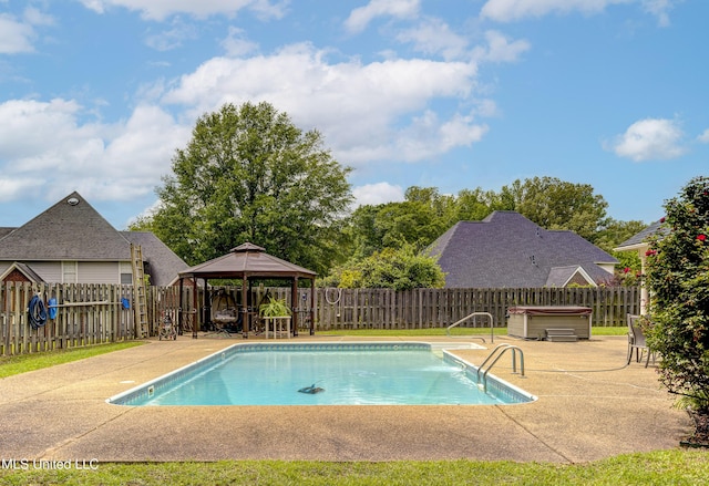 102 Grand Bear Cir, Vicksburg, MS 39183 - view of pool with a hot tub, a gazebo, a patio area, and a fenced backyard