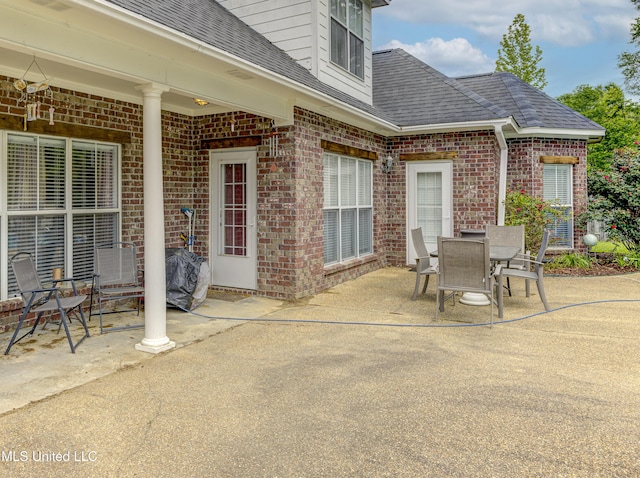 102 Grand Bear Cir, Vicksburg, MS 39183 - view of patio featuring outdoor dining area
