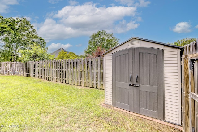 102 Grand Bear Cir, Vicksburg, MS 39183 - view of shed with a fenced backyard