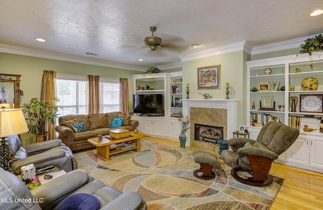 102 Grand Bear Cir, Vicksburg, MS 39183 - living room featuring crown molding, light wood-type flooring, visible vents, ceiling fan, and recessed lighting