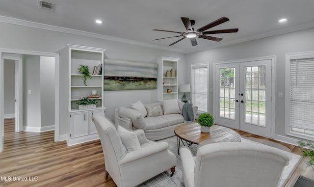 105 Lilac Ct, Madison, MS 39110 - living area featuring french doors, ceiling fan, light wood-type flooring, ornamental molding, and recessed lighting