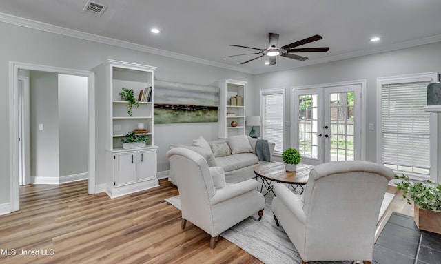 105 Lilac Ct, Madison, MS 39110 - living room with french doors, ceiling fan, light wood-style flooring, ornamental molding, and recessed lighting