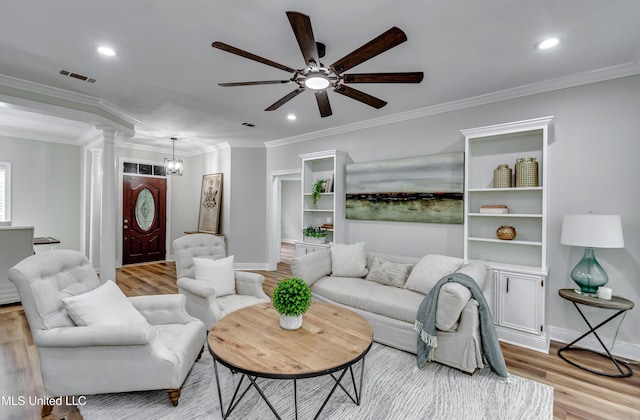 105 Lilac Ct, Madison, MS 39110 - living area featuring wood finished floors, ceiling fan, ornate columns, crown molding, and recessed lighting