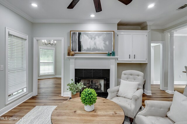 105 Lilac Ct, Madison, MS 39110 - living room featuring ceiling fan, wood finished floors, ornate columns, recessed lighting, and ornamental molding