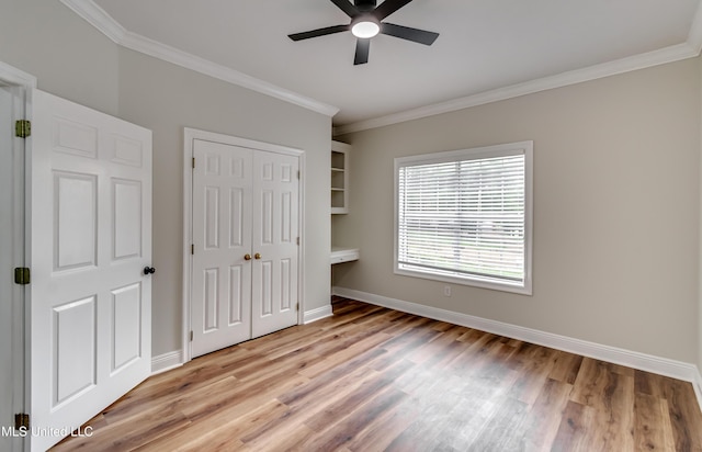 105 Lilac Ct, Madison, MS 39110 - unfurnished bedroom with ornamental molding, light wood finished floors, a closet, and a ceiling fan
