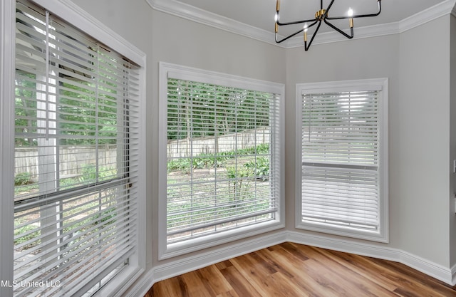 105 Lilac Ct, Madison, MS 39110 - detailed view of a chandelier, wood finished floors, and ornamental molding